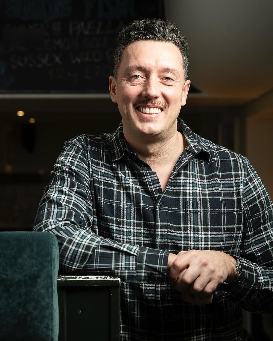 A founder with the specials chalkboard.